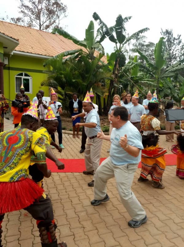 Visiting volunteers get entertained with a colourful traditional dance